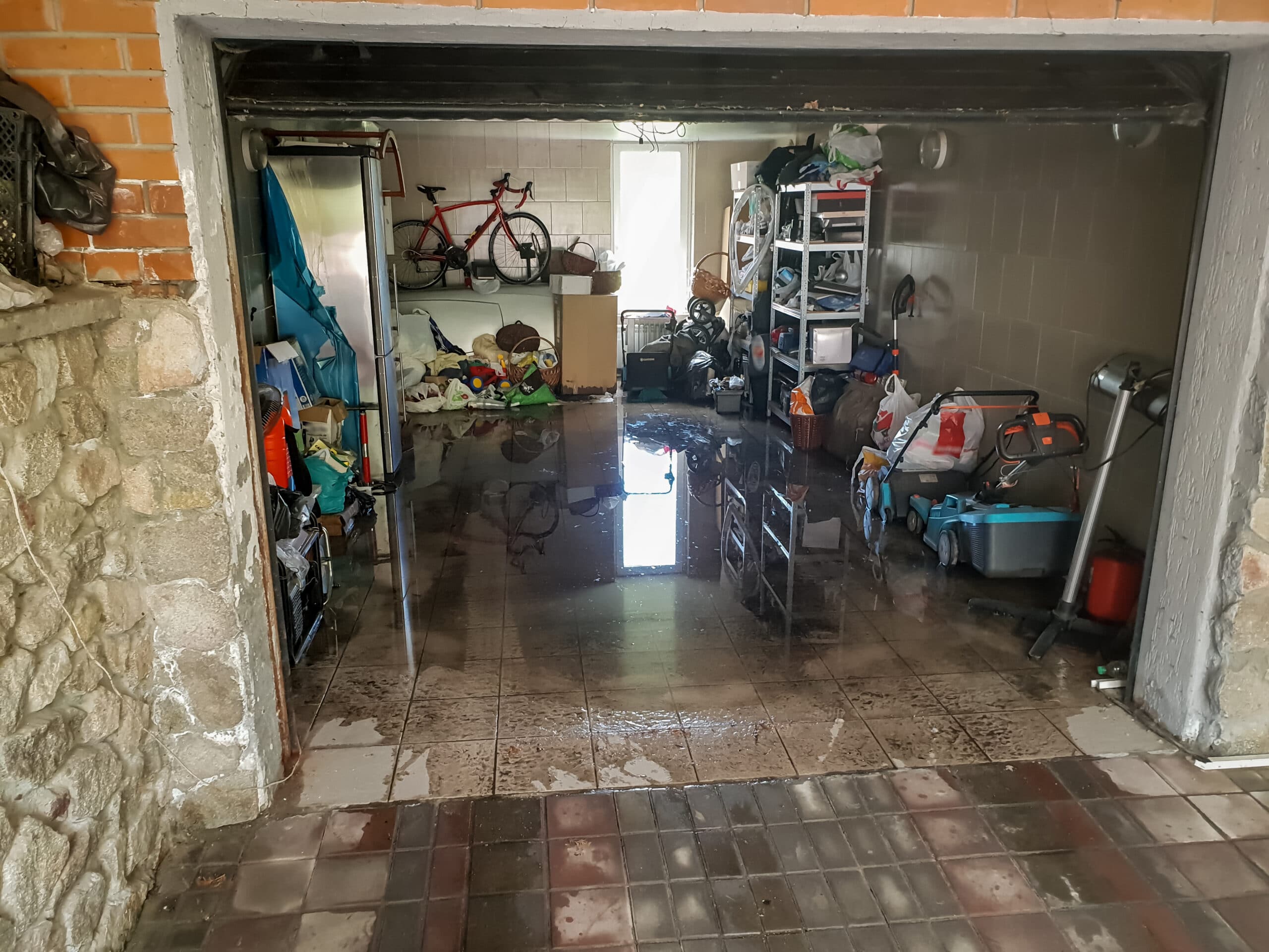 A flooded garage basement after heavy rain