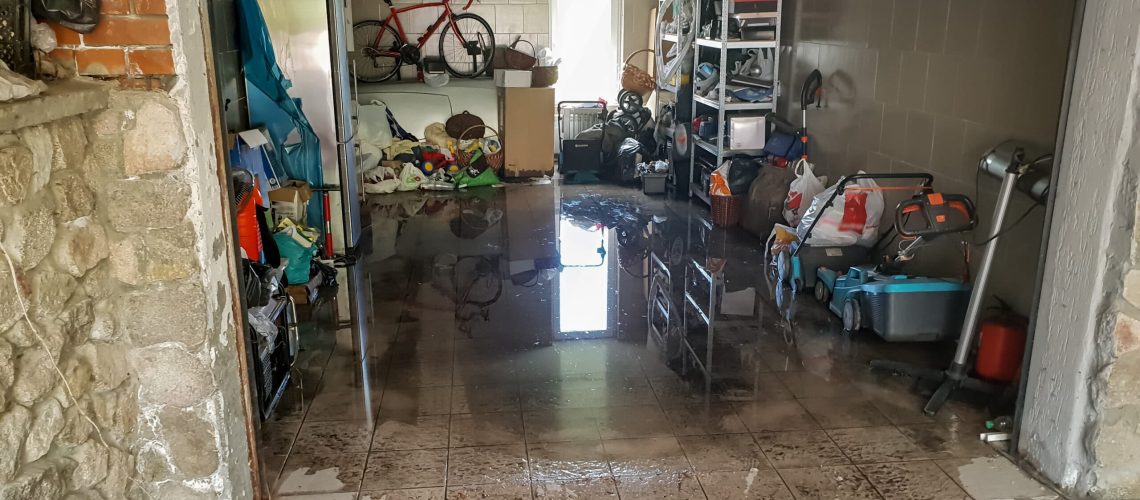 A flooded garage basement after heavy rain